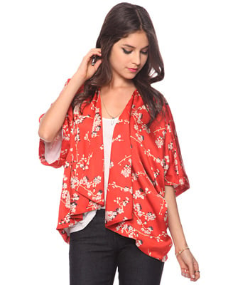 Do a double salute to the heritage of the blooms with this kimono-style coverup.