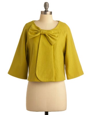 A ladylike coverup in deep chartreuse.