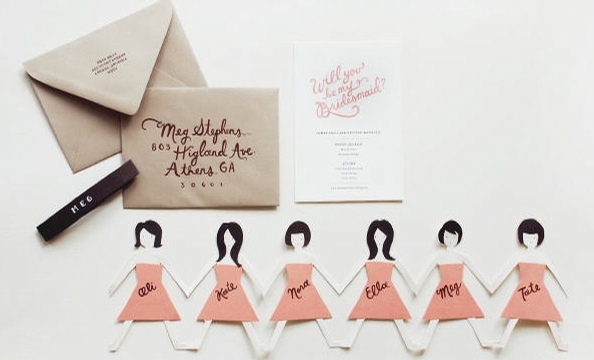 DIY instructions available at http://www.oncewed.com/16446/wedding-blog/diy-wedding/diy-bridesmaids-cards/