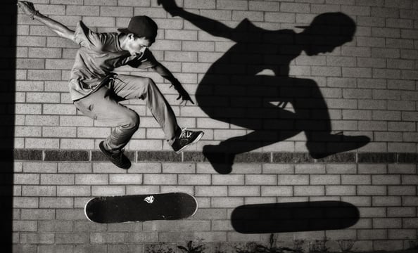 "Skateboard Shadow".  Gibson, a 17-year-old senior at Chantilly High School, regularly skates with friend Troy Hellman.  One night, Gibson decided to bring along his camera gear, a Canon EOS 40D with a 16-to-35 millimeter lens and an external flash.  He t