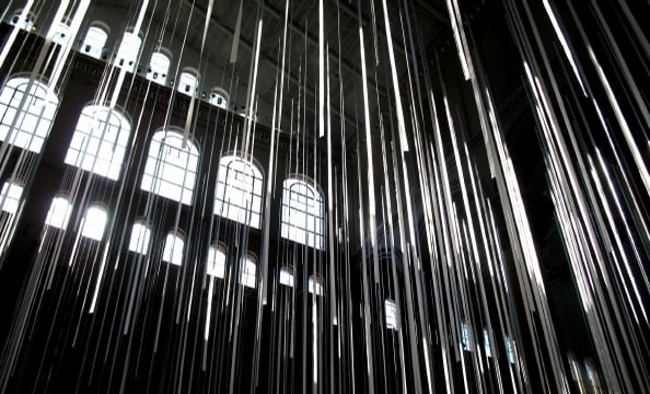 This photo was taken at the National Building Museum before a party. The photographer thought the streamers created a nice contrast next to the light from the windows. 