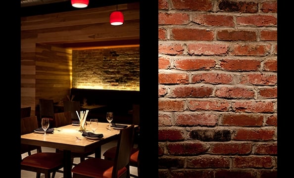 The restaurant has industrial accents like exposed brick and steel ceiling beams.