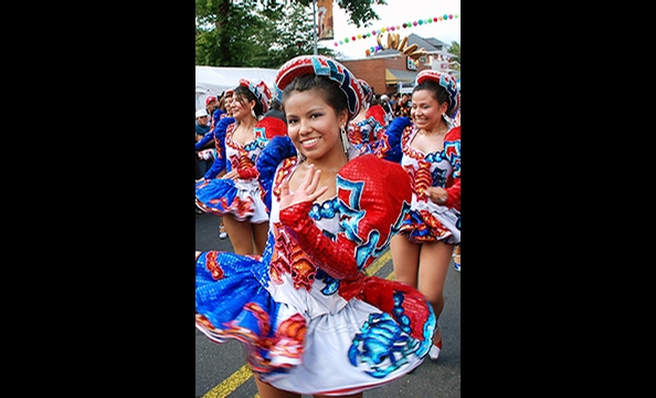 A young woman celebrates her heritage in Mt. Pleasant's Latino Festival.  