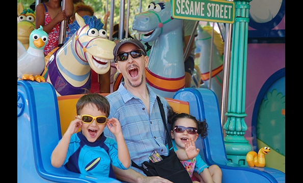 The photographer's family indulges in a little childhood fun.  