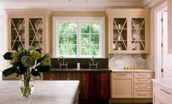 Fashion icon Coco Chanel inspired this feminine kitchen in McLean's Spring Hill Farm community. "I wanted it to be as pretty as a dress shop," says architect J. Paul Lobkovich of Vienna's Lobkovich Kitchen Designs.  