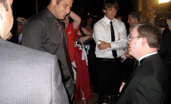 Washington Redskins player Chris Cooley, who was presented with the Solid Character Award later in the evening is excited to see Special Olympian and global messenger speaker for the Special Olympics Frank Stephens. Stephens later inducted Eunice Kennedy 