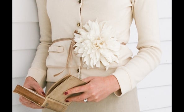 Carrie Bradshaw started the trend, and we're bringing it back. Belts, blazers, dresses— flower pins on everything!
