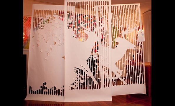 Havndrup used an X-acto knife to meticulously cut this hanging mural out of extra-larger printer paper.  It depicts the Snow Queen's reindeer-drawn sleigh skating through an avalanche after she's kidnapped Kai.  