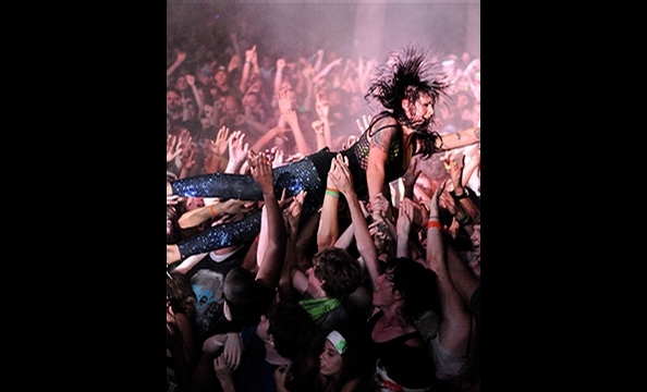 At the Virgin Mobile FreeFest, DC's Michael Kandel was the only photographer onstage during a turbocharged performance by the up-and-coming indie band Sleigh Bells. The lead singer, Alexis Krauss, walked up to the edge of the stage and held her mike out t