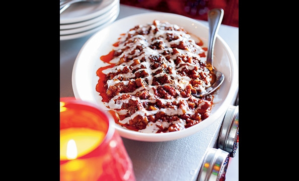 At Maizbon, a flavorful meat sauce and drizzle of yogurt cover the Afghan leek dumplings known as aushak.