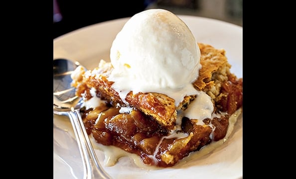 If there's a seasonal cobbler on the menu at Ray's the Steaks at East River, don't miss it.