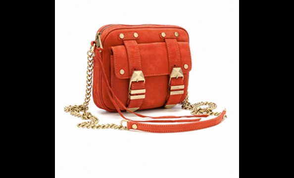 First, there was the boyfriend jean. Then came the boyfriend blazer, sweater, and cardigan. We'd think twice before letting our guy out of the house carrying any sort of purse, but this "boyfriend" cross-body will work quite well for us, thanks.