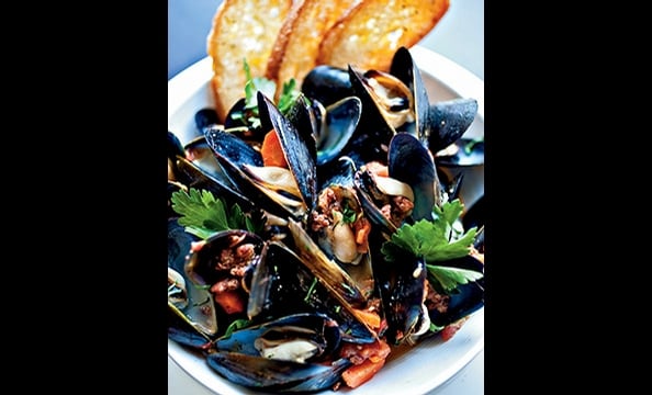 Chorizo and mussels are a terrific, Portuguese-inspired pairing at Ris in DC's West End. 