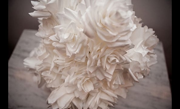 Giannasio created realistic looking flowers by curling the edges of her coffee filter petals with a toothpick.  Talk about labor intensive! 