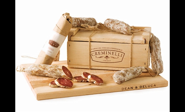 Artisan salami, flavored with truffles, Barolo wine, and juniper berries, packaged in a rustic wooden box. Creminelli Salami Trio gift box, $75.   