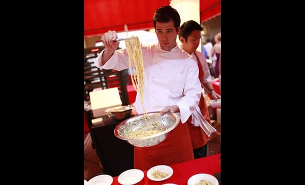 Area chefs bring their most impressive dishes to the party. Here, Bibiana's Nick Stefanelli portions out pasta.
