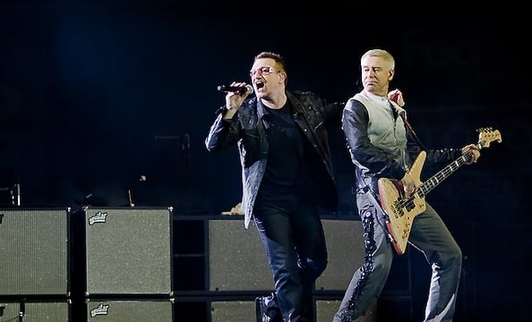 Bono and Clayton onstage at FedEx Field.