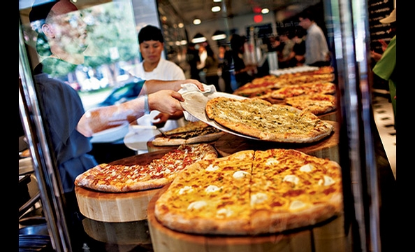 Spike Mendelsohn's We, the Pizza on Capitol Hill specializes in takeout slices with offbeat toppings.