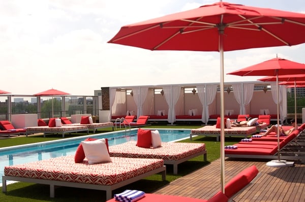 There are plenty of cabanas, chairs, and beds to lounge on around the pool.