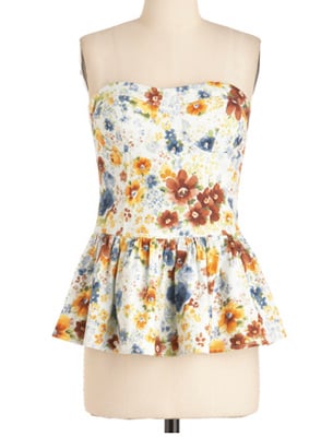 Pop a fitted blazer or cardigan over this floral strapless top, which is versatile enough to wear to work or on a date.