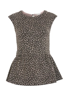 Try adding a touch of leopard to an all-black ensemble with this fun top.