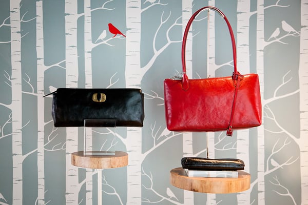 Delanna turn-lock clutch (left, $138), and Lola shoulder bag (right, $168).