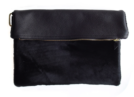 This sleek piece is made with trendy <a href="https://www.washingtonian.com/blogs/shoparound/jewelry-accessories/trend-spotting-20-haircalf-accessories-photos.php">calfhair</a>—one of the season’s most coveted materials. $190 at <a href="http://www.twistedaristocrat.com/fold/black-calf-fold-clutch/">Twisted Aristocrat</a>.