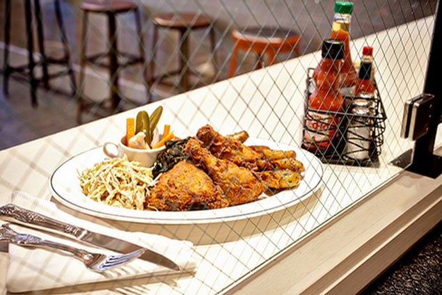 Get Pearl Dive's divine fried chicken packed up to-go in a picnic basket. Photograph by Scott Suchman