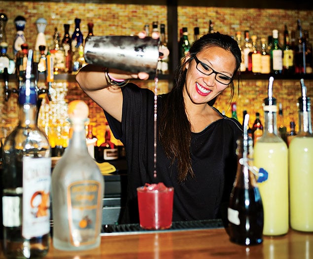 Tico bartender Christine Kim pours festive drinks. Photograph by Scott Suchman