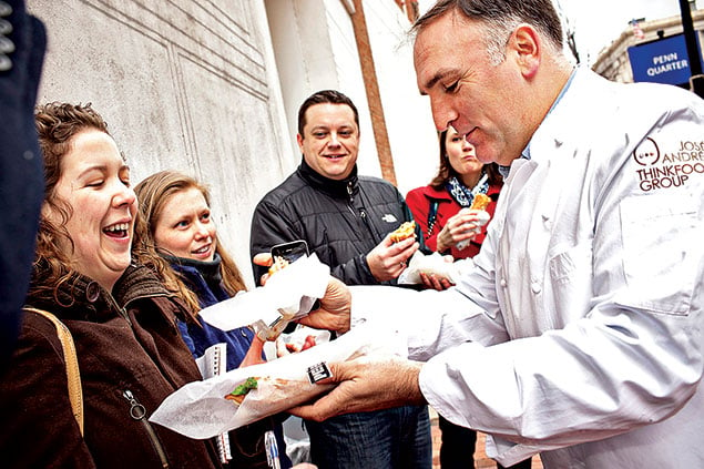 Chef José Andrés handing out sandwiches from his Pepe food truck. Photograph by Scott Suchman.