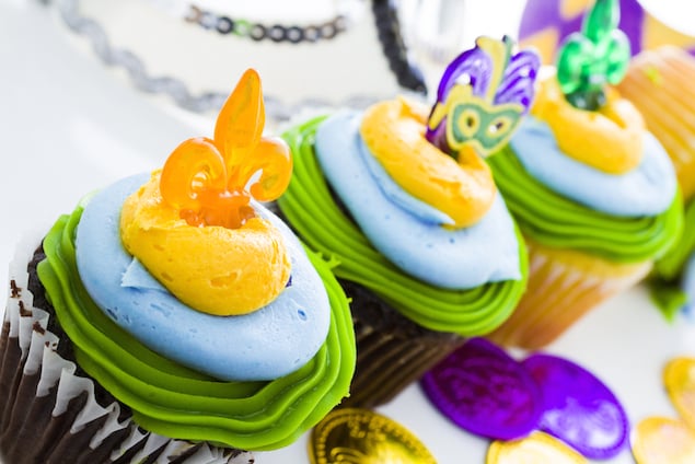 Celebrate Mardi Gras with Cajun eats, king cake, and plenty of cocktails. Photograph via Shutterstock.