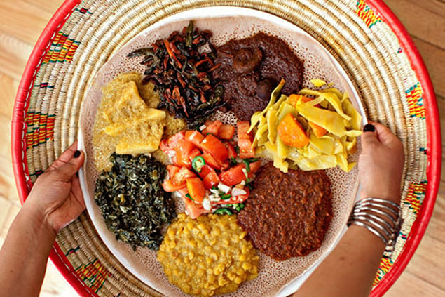 DC Staycation: Try the delicious <em>wats </em>and <em>injera</em> at Ethiopic. Photograph by Scott Suchman.