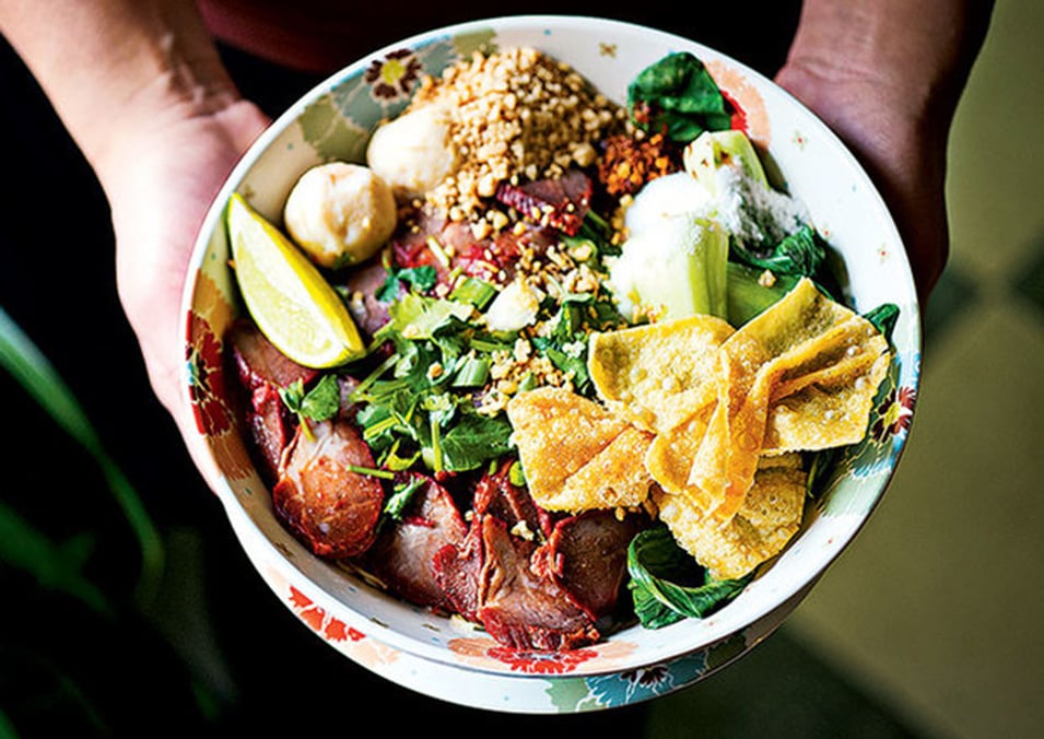 Cheap Restaurants Large Groups. Barbecue pork, crunchy peanuts, and baby bok choy top a bowl of egg noodles at Thai Taste by Kob. Photograph by Scott Suchman.