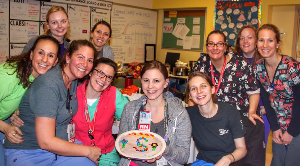 Sarah Thomas, RN, (center) a nurse in the Pediatric Intensive Care Unit at Children’s National Health System, celebrates her 26th birthday snowed in the hospital on January 23, 2016. 