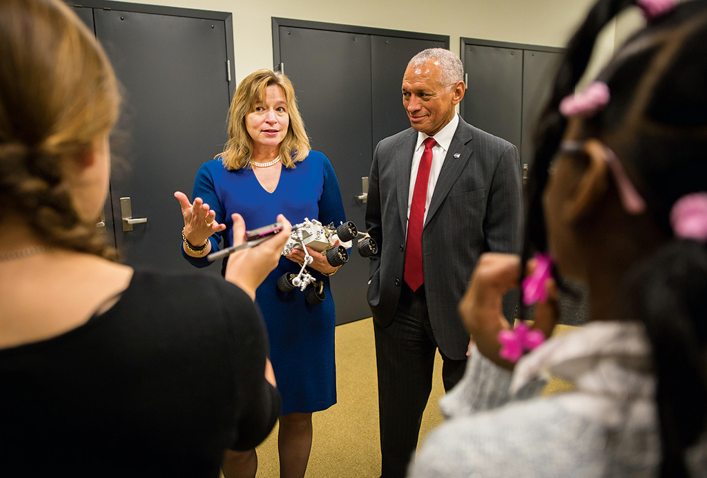 Space rover: Stofan—with NASA administrator Charles Bolden Jr., meeting kid reporters at a White House-sponsored event—believes scientists need to get better at explaining their work to people. Photograph by NG Images/Alamy