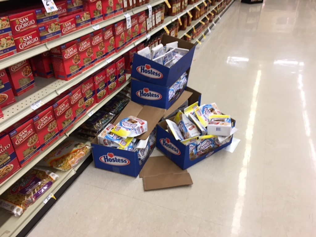 A Reston supermarket restocks its Hostess shelves before the winter storm hit Washington, DC. Photograph courtesy of Dorothy West