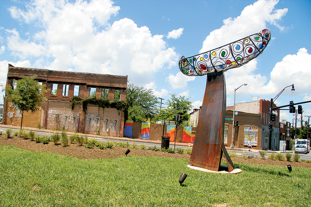 Boat lift: The metal canoe atop the “Journey Anacostia” sculpture lights up at night. Photograph Courtesy of Wilfredo Valladares 