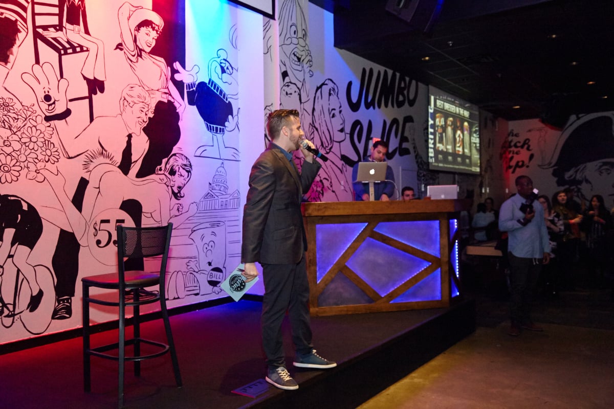 District Trivia host Rob Loreto gets the crowd ready for Singled Out DC. 