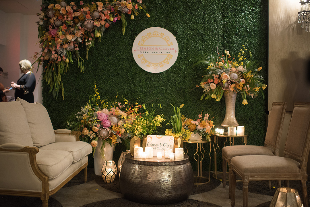 Crimson & Clover Floral Design created a relaxing and intimate space for guests at their booth.