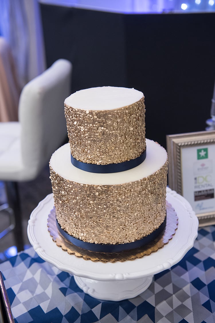 An intricate gold wedding cake made by RSVP Catering. 