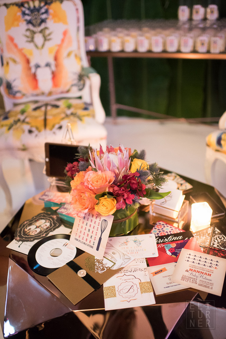 Taylor and Hov Events + Design set up a beautiful display of invitations on a coffee table in their booth. 