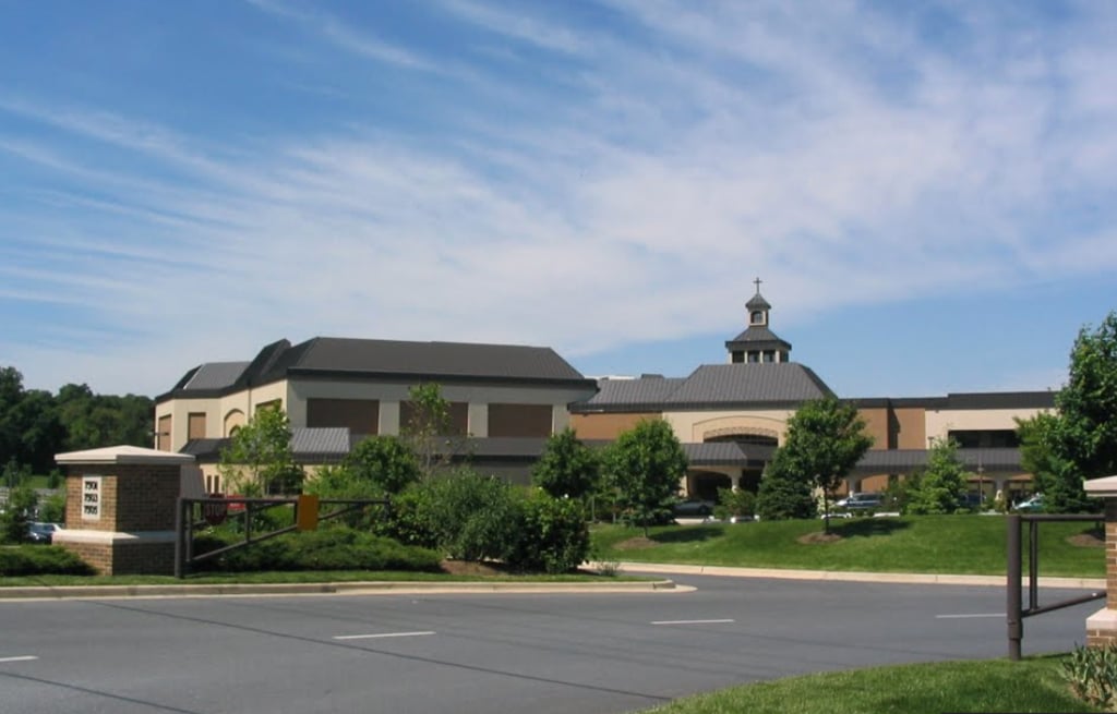Sovereign Grace Ministries wrote and licensed its own music, stocked its own bookstores, and encouraged Christian education. "To have kids in public school, that was like sending your kids to hell," says a former member. Photograph of Covenant Life Church in Gaithersburg courtesy of Google.