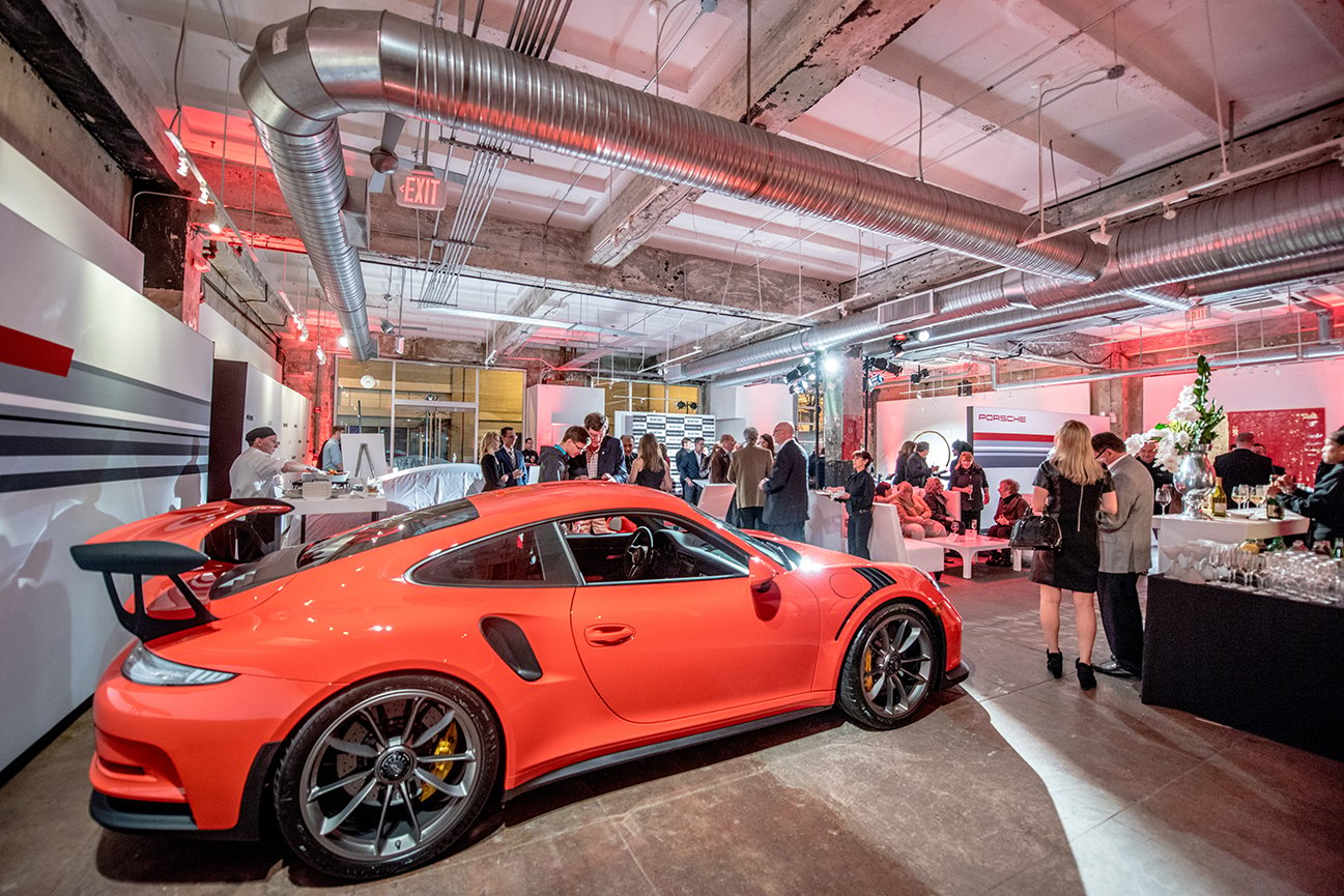 The 2016 Porsche 911 GT3 RS in Lava Orange is a street legal race car. 