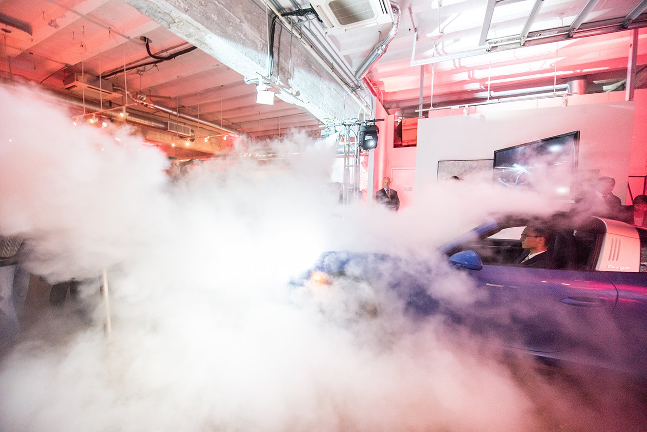 The new Porsche 911 drove through a cloud of smoke and into the gallery during the big reveal. 