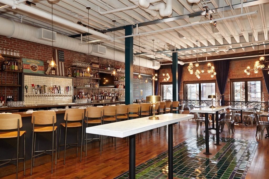 A cozy entry-level dining room, located on the second floor of the building, seats 60.