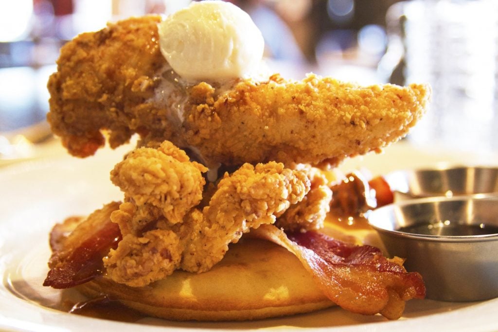 Dig into a pancake skillet with fried chicken and bacon at Mulebone. Photograph courtesy of Mulebone