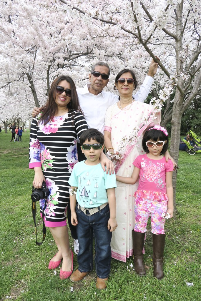 This woman's (left) parents came all the way from India to see the cherry blossoms and their two young grandchildren.