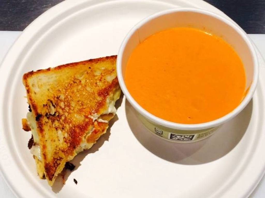 The daily grilled cheese and tomato soup combo can be eaten at Ris, or ordered via delivery. Photograph via Ris Facebook 