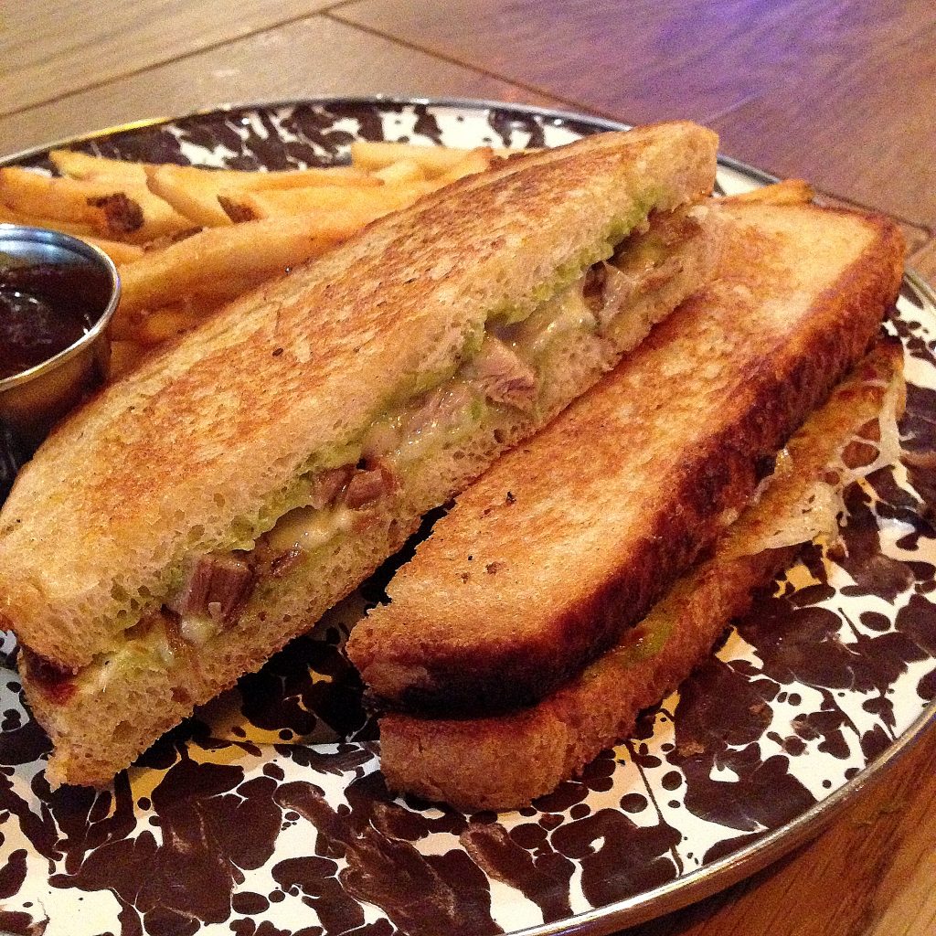 Drafting Table's sandwich combines two of our favorite things: Peking duck pancakes and grilled cheese. Photograph via Drafting Table