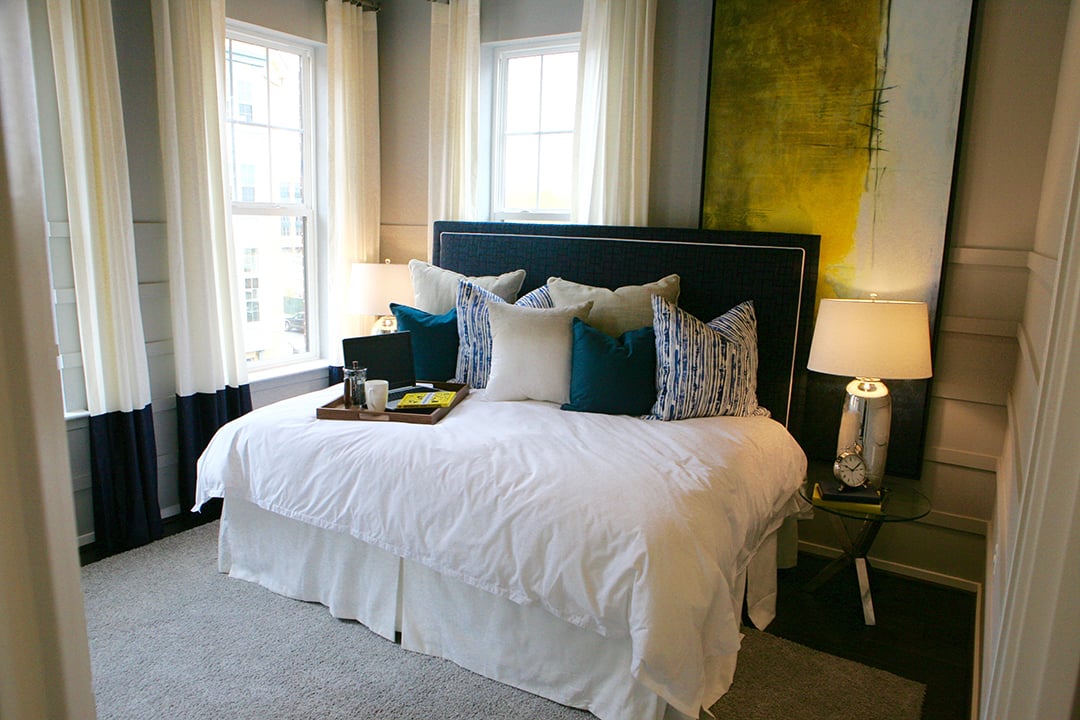 This second floor bedroom is spacious and was beautifully decorated by PFour. 